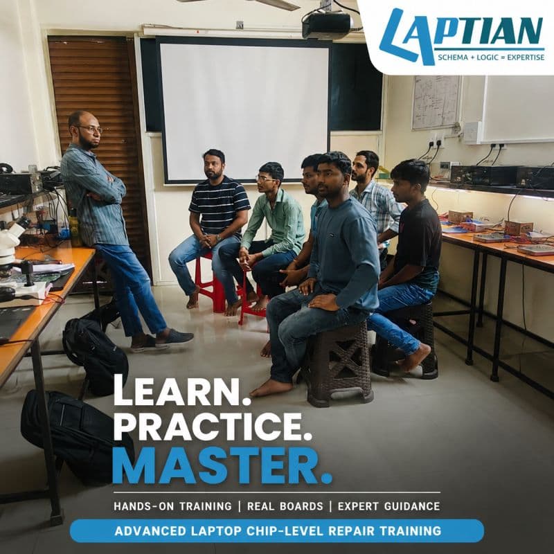 Hands-on laptop chip-level repair training session with instructor and students at Laptian Technical Institute in Pune